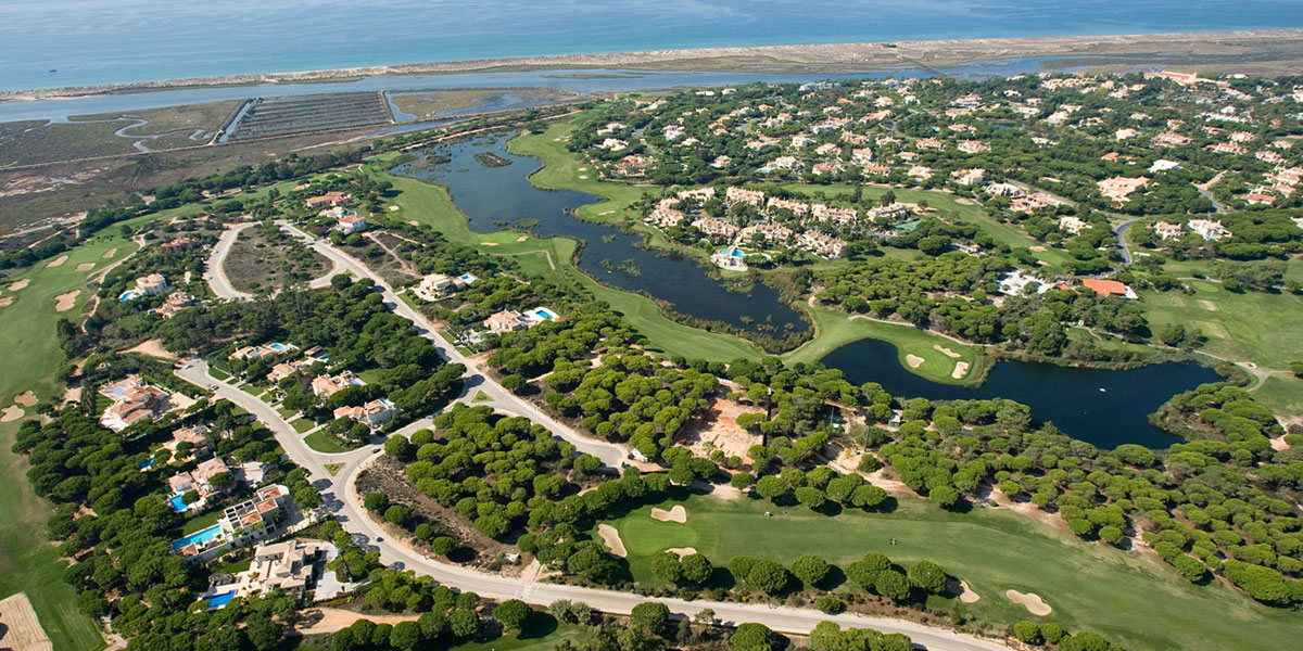 Aerial view of Quinta do Lago resort and golf courses at JustGo Transfers, door to door transfers Algarve.
